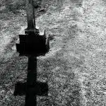 grayscale photography of gray tombstone